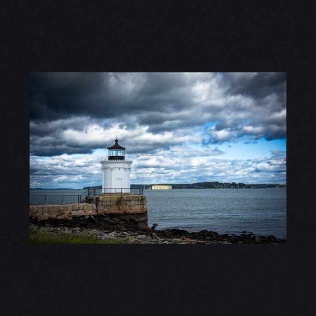 Bug Light Under a Dramatic Sky by Debra Martz